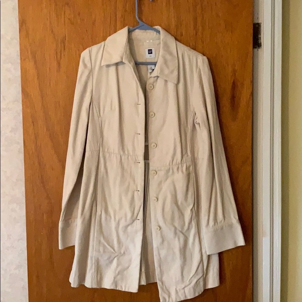 Beige colored, GAP trench coat.  Like NEW!